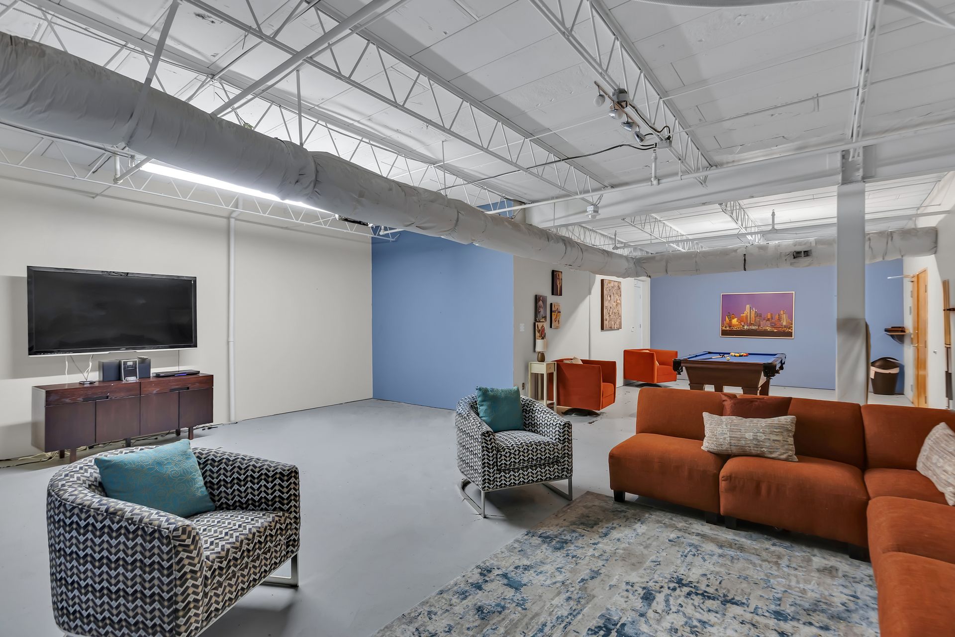 Club room television lounge at 1900 Elm Lofts
