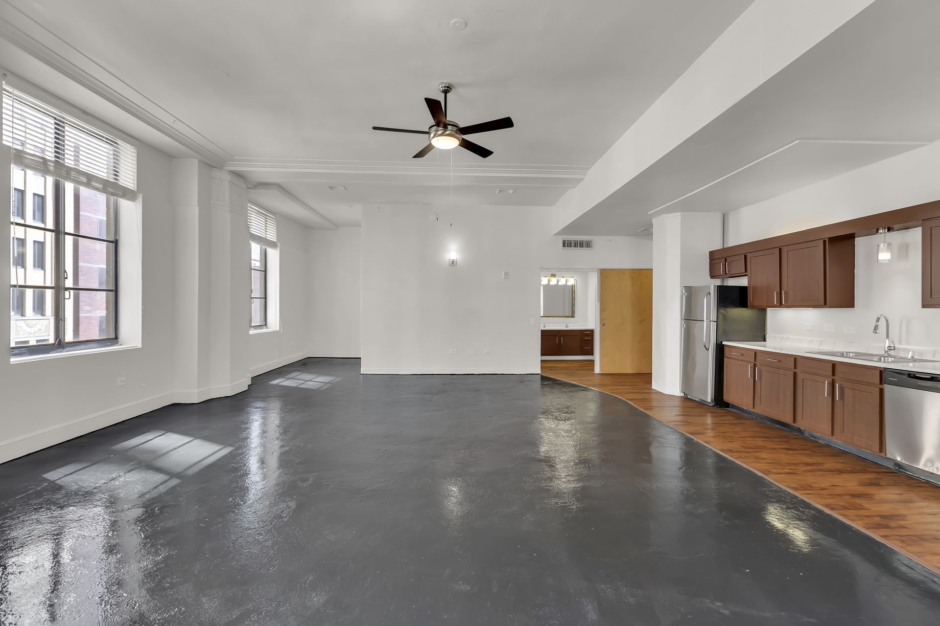 Grand Loft 416 corner residence with wraparound windows, 1900 Elm Lofts