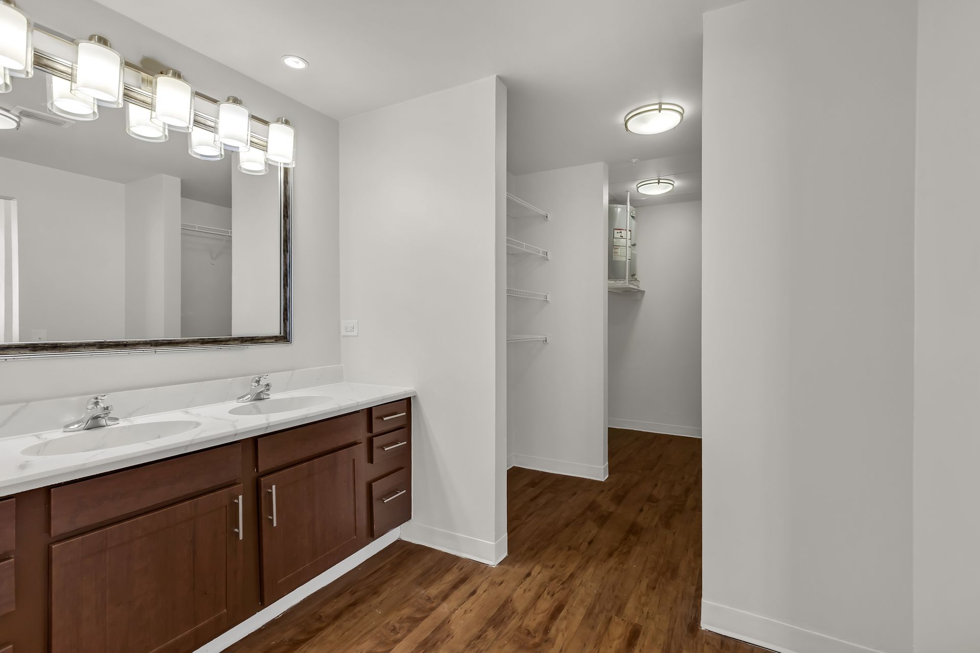 Double vanity bathroom in a Grand Loft, 1900 Elm Lofts